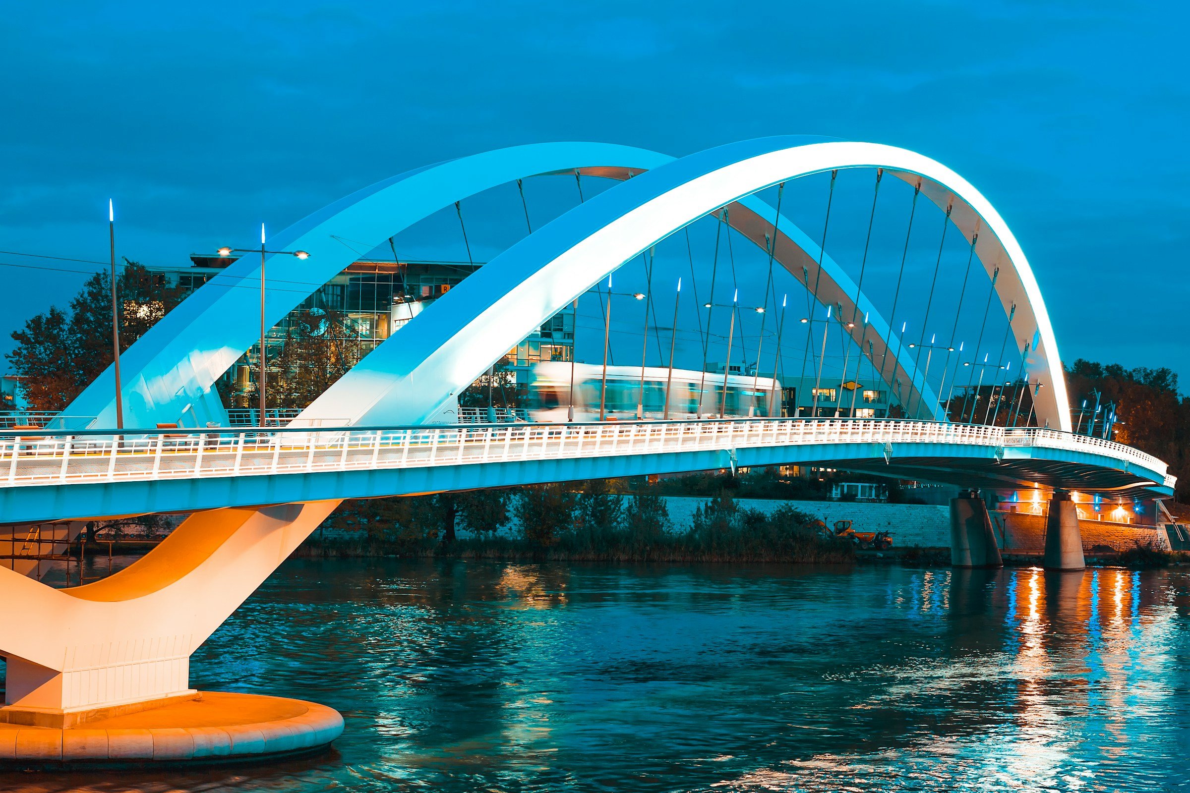 Famous bridge in central Lyon over a river during the evening